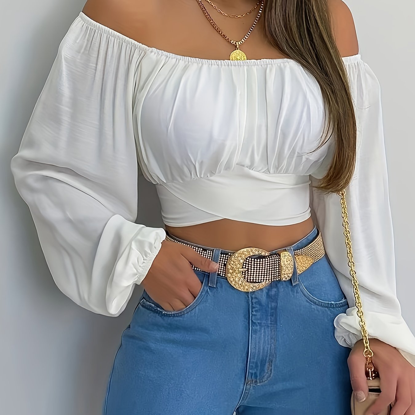 Blusa corta lisa con lazo en la espalda