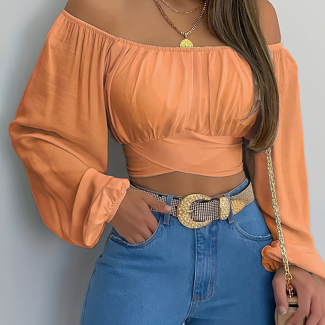 Blusa corta lisa con lazo en la espalda