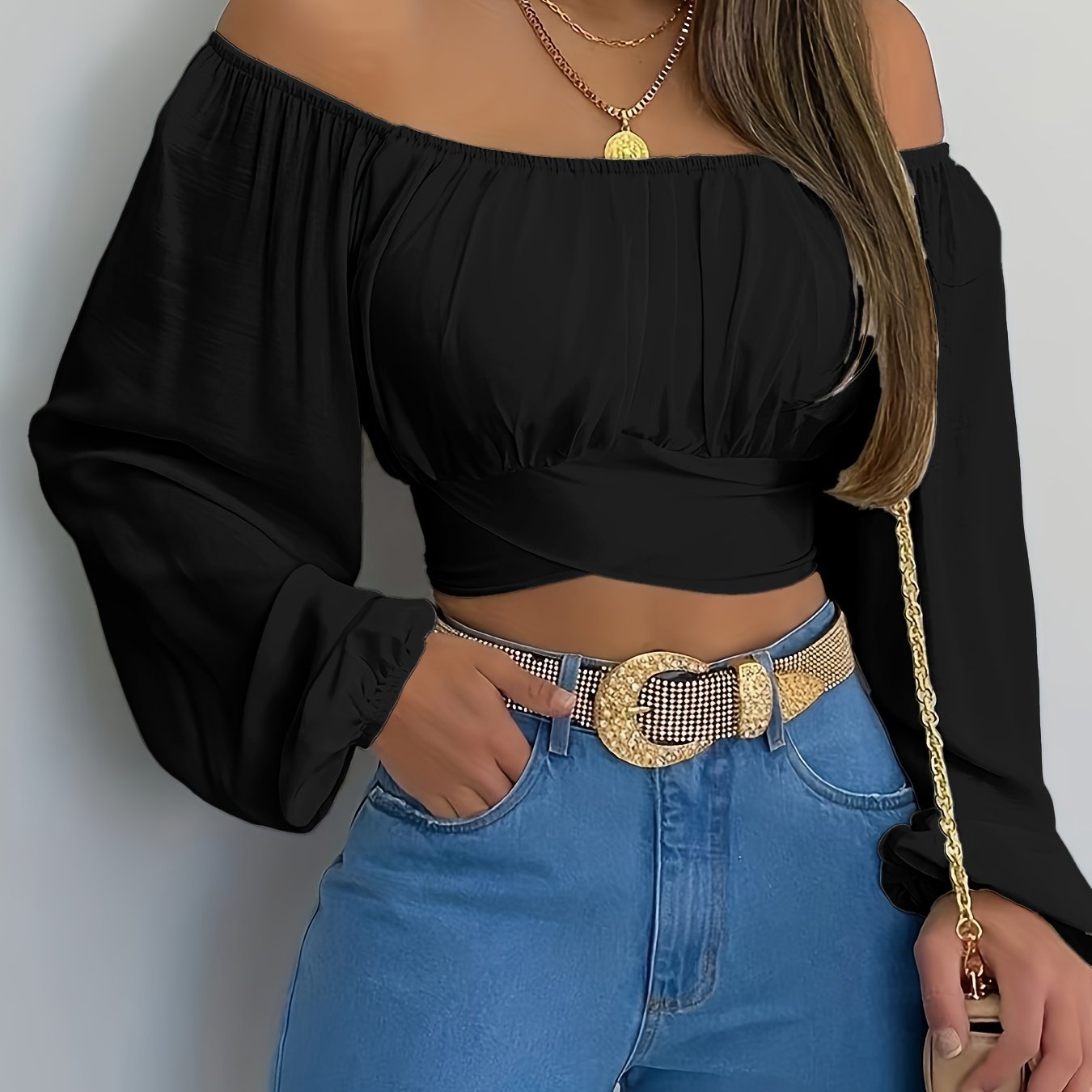 Blusa corta lisa con lazo en la espalda