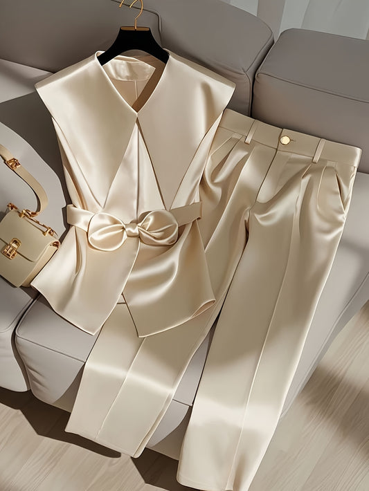 Elegante y estilizado conjunto de top sin mangas y pantalón largo en color liso, diseñado para atraer la riqueza.